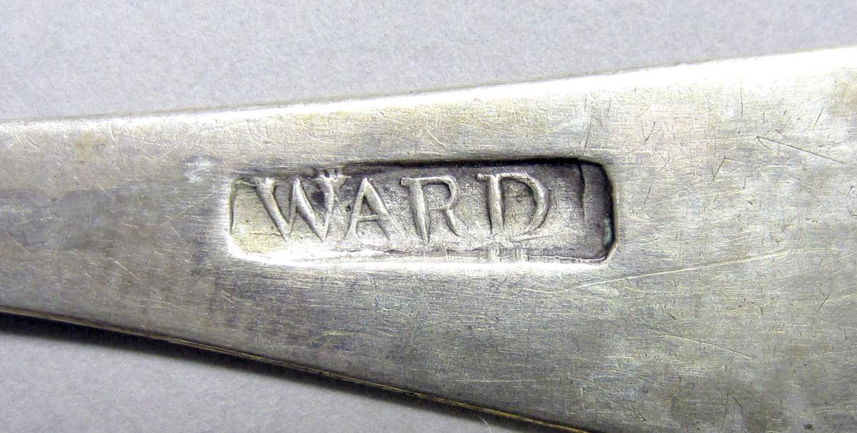 1962.0240.618 Silver spoon mark