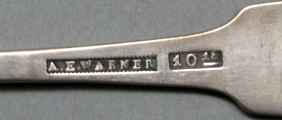 1962.0240.619 Silver spoon mark