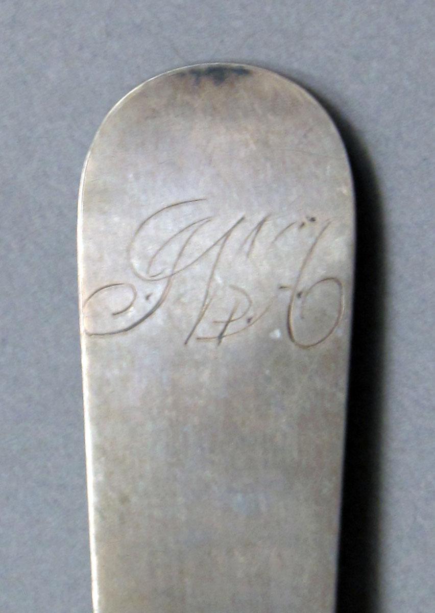 1962.0240.620 Silver spoon engraving