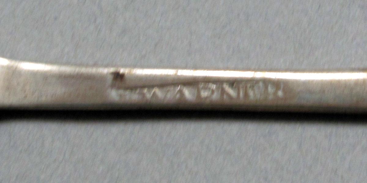 1962.0240.621 Silver spoon mark