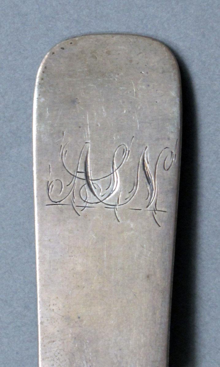 1962.0240.622 Silver spoon engraving
