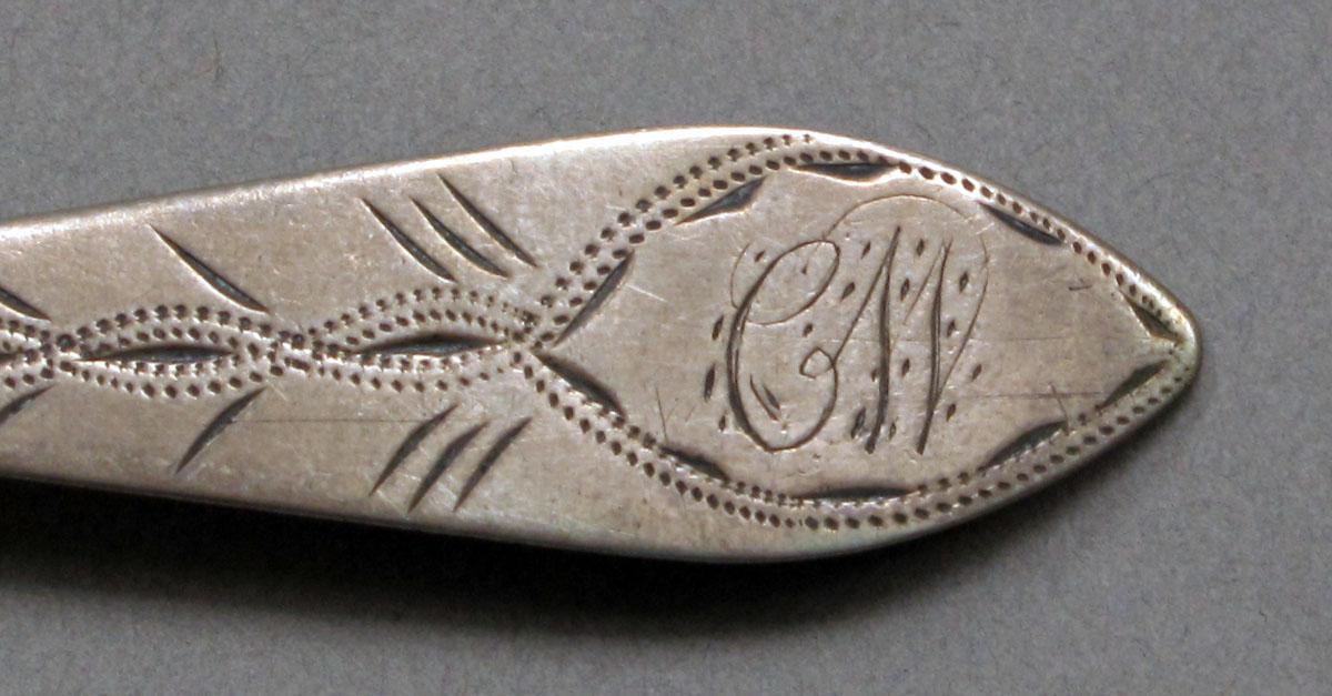 1962.0240.624 Silver spoon engraving