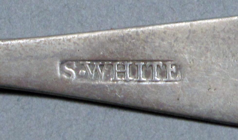 1962.0240.624 Silver spoon mark
