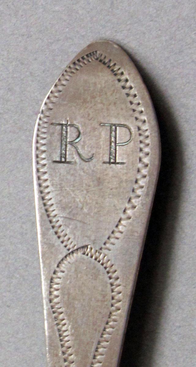 1962.0240.626 Silver spoon engraving
