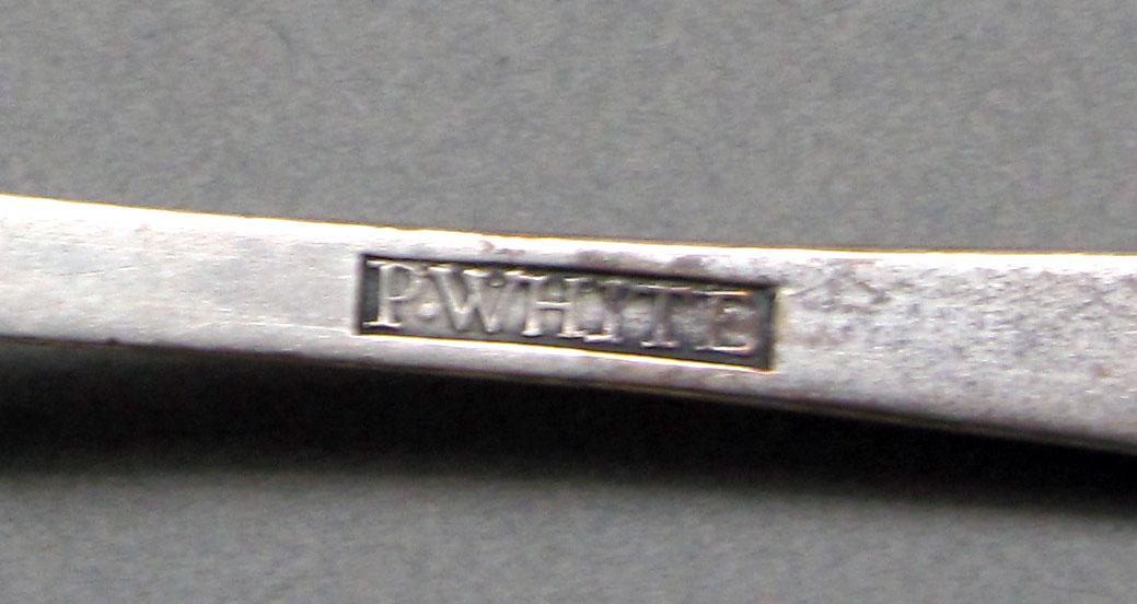 1962.0240.626 Silver spoon mark
