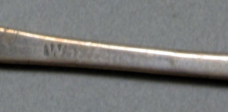 1962.0240.627 Silver spoon mark