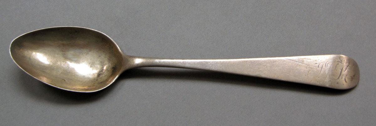 1962.0240.628 Silver spoon upper surface
