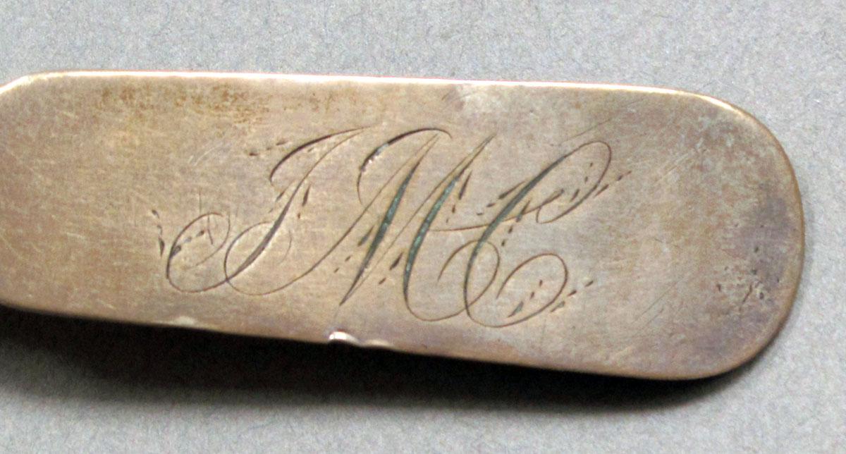 1962.0240.629 Silver spoon engraving