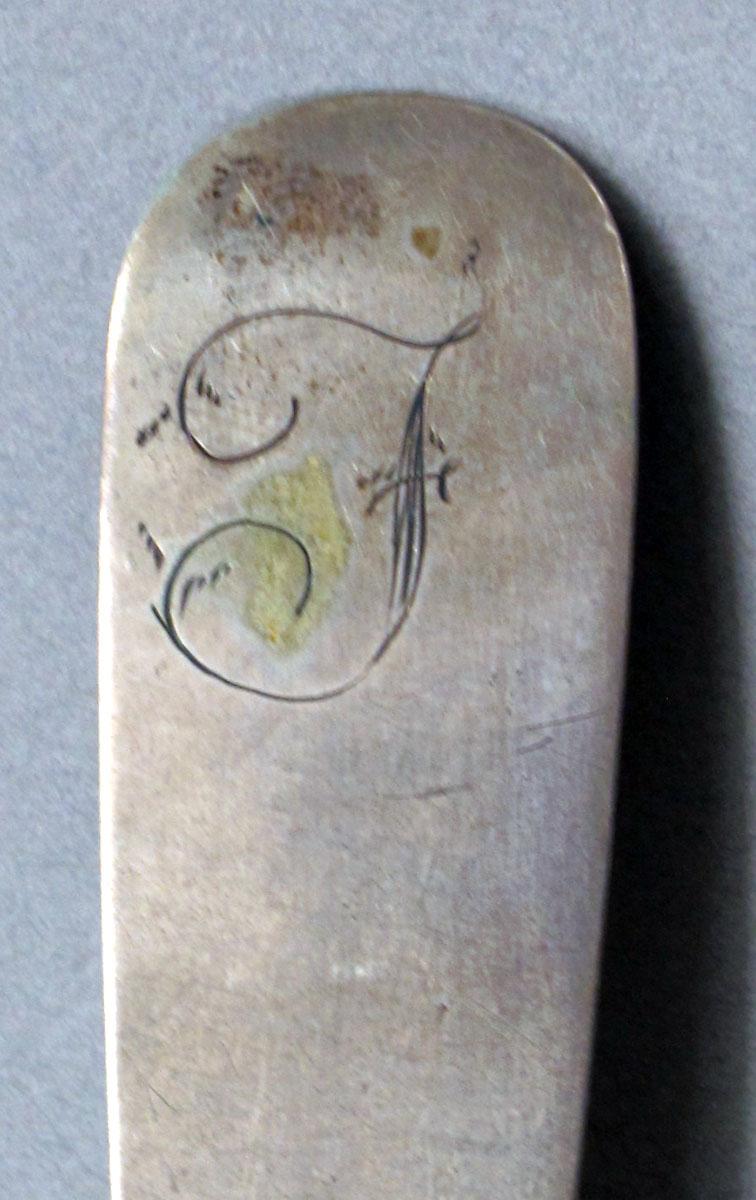 1962.0240.630 Silver spoon engraving