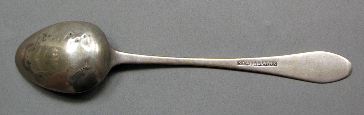 1962.0240.631 Silver spoon underside