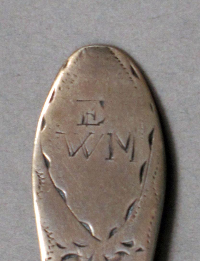 1962.0240.631 Silver spoon engraving