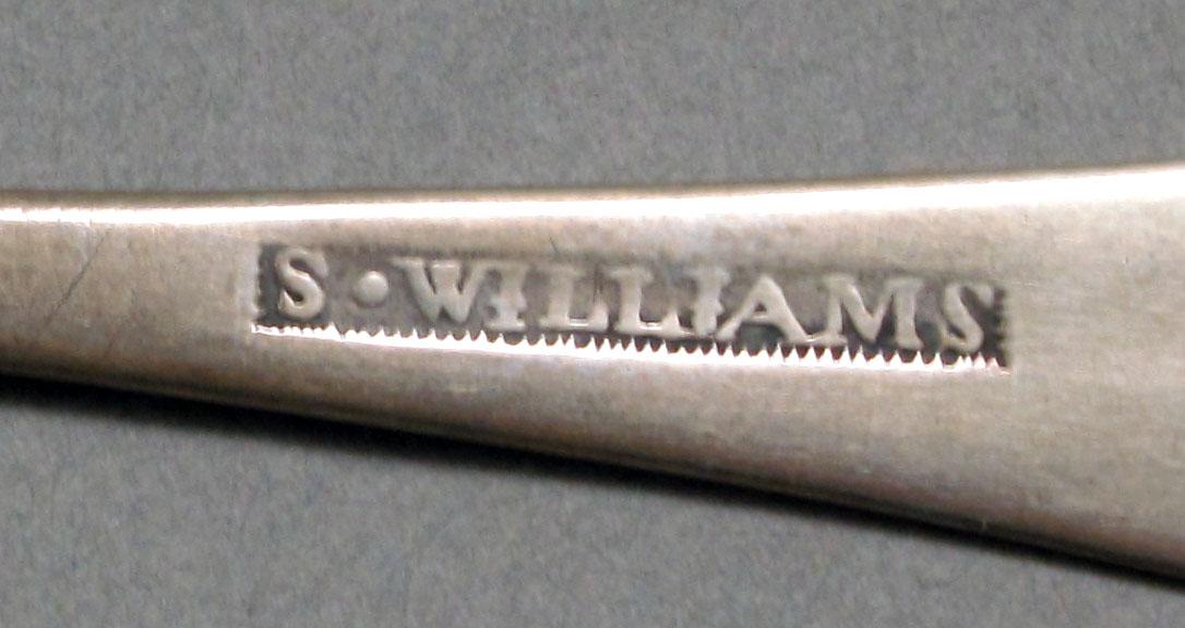 1962.0240.631 Silver spoon mark