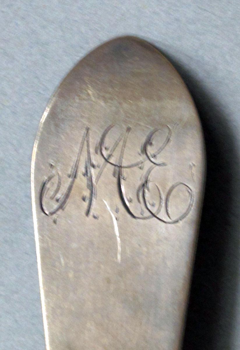 1962.0240.633 Silver spoon engraving