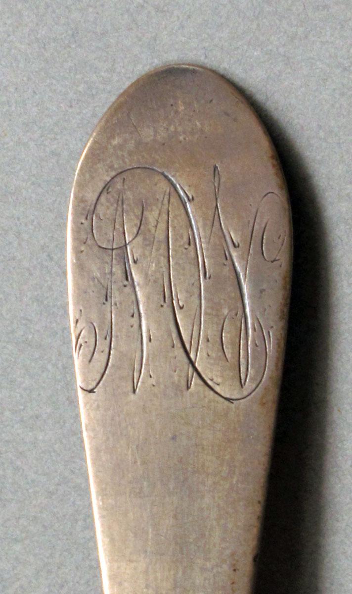 1962.0240.634 Silver spoon engraving