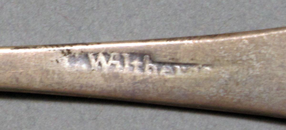 1962.0240.634 Silver spoon mark