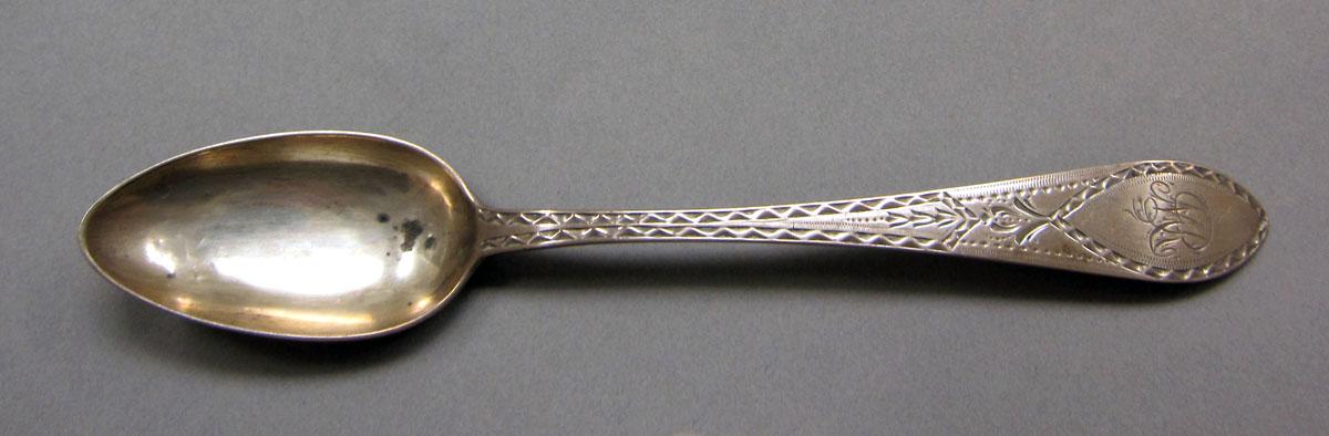 1962.0240.635 Silver spoon upper surface