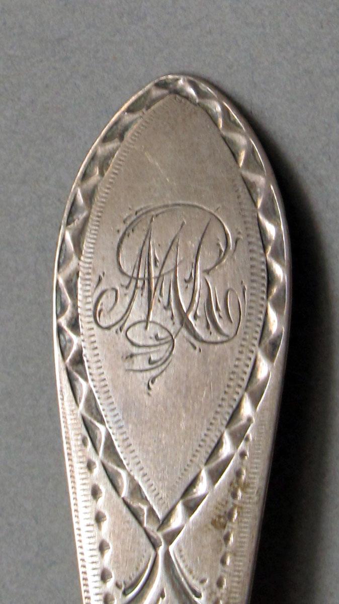 1962.0240.635 Silver spoon engraving