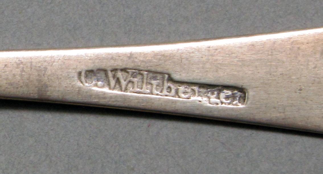 1962.0240.635 Silver spoon mark