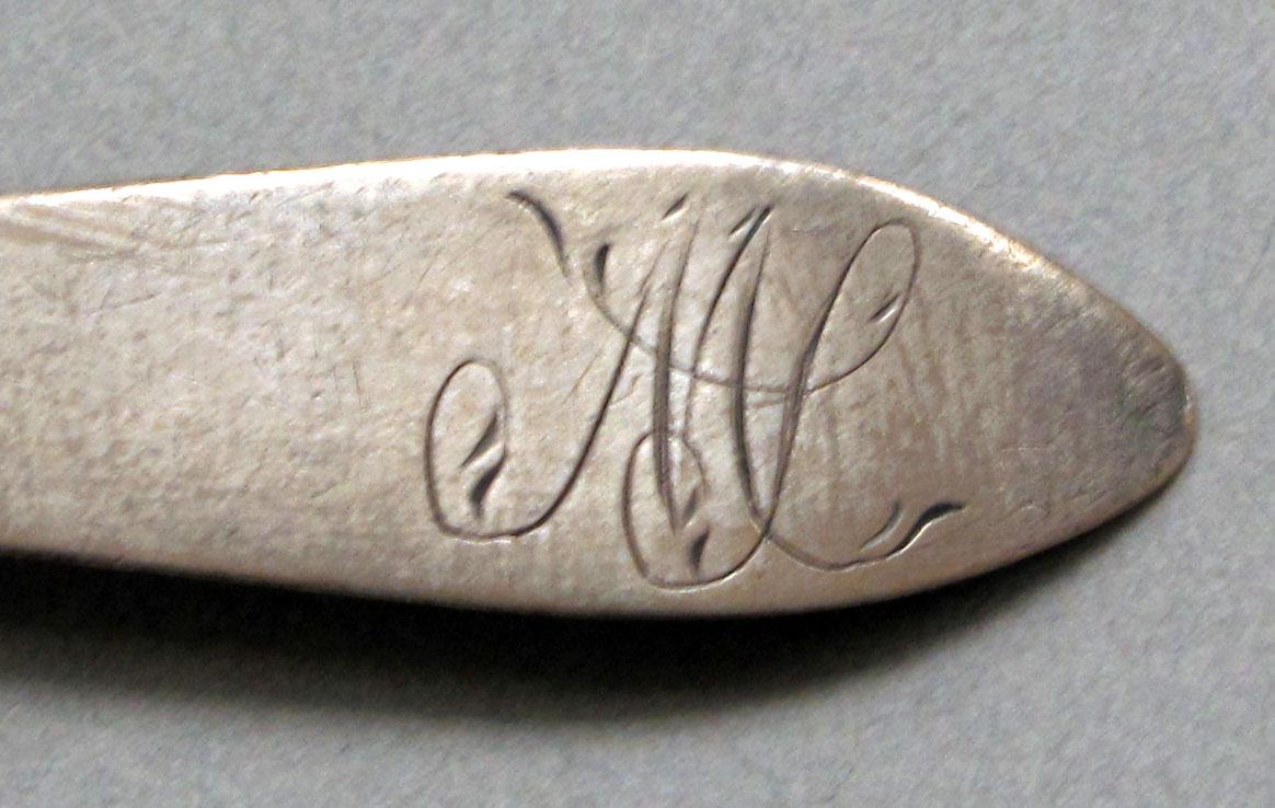 1962.0240.636 Silver spoon engraving