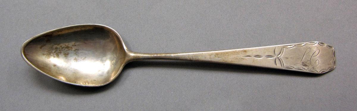 1962.0240.637 Silver spoon upper surface