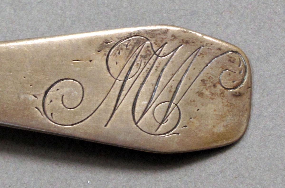 1962.0240.640 Silver spoon engraving