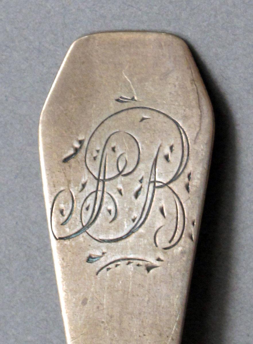 1962.0240.641 Silver spoon engraving