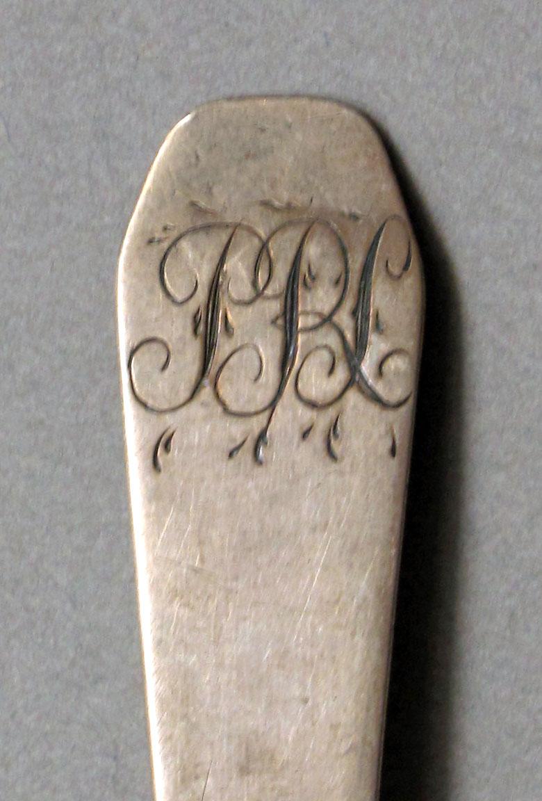 1962.0240.643 Silver spoon engraving