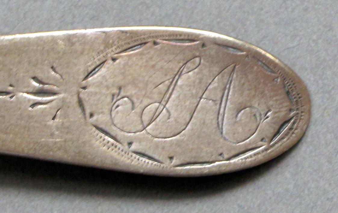 1962.0240.644 Silver spoon engraving