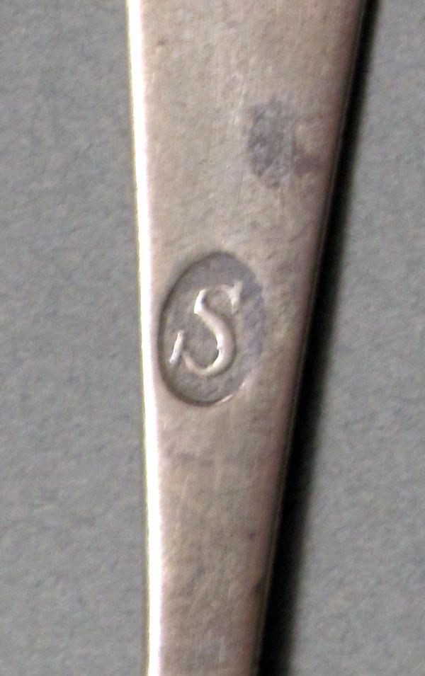 1962.0240.644 Silver spoon mark