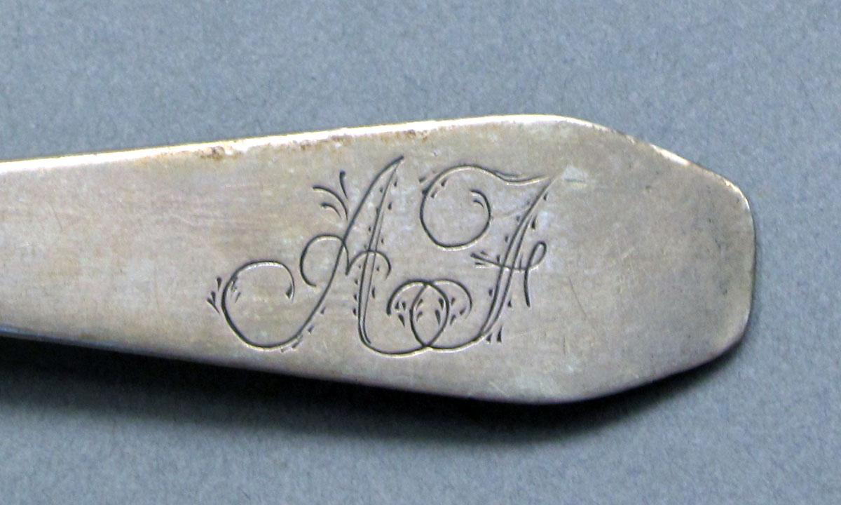 1962.0240.645 Silver spoon engraving