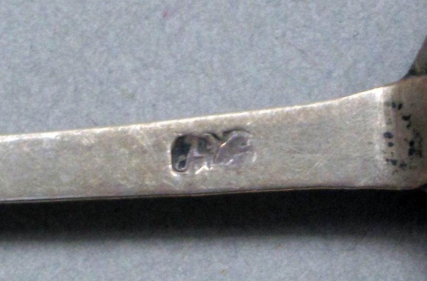 1962.0240.646 Silver spoon mark