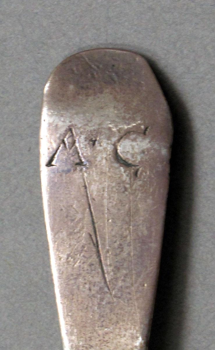 1962.0240.648 Silver spoon engraving