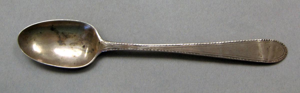 1962.0240.653 Silver spoon upper surface