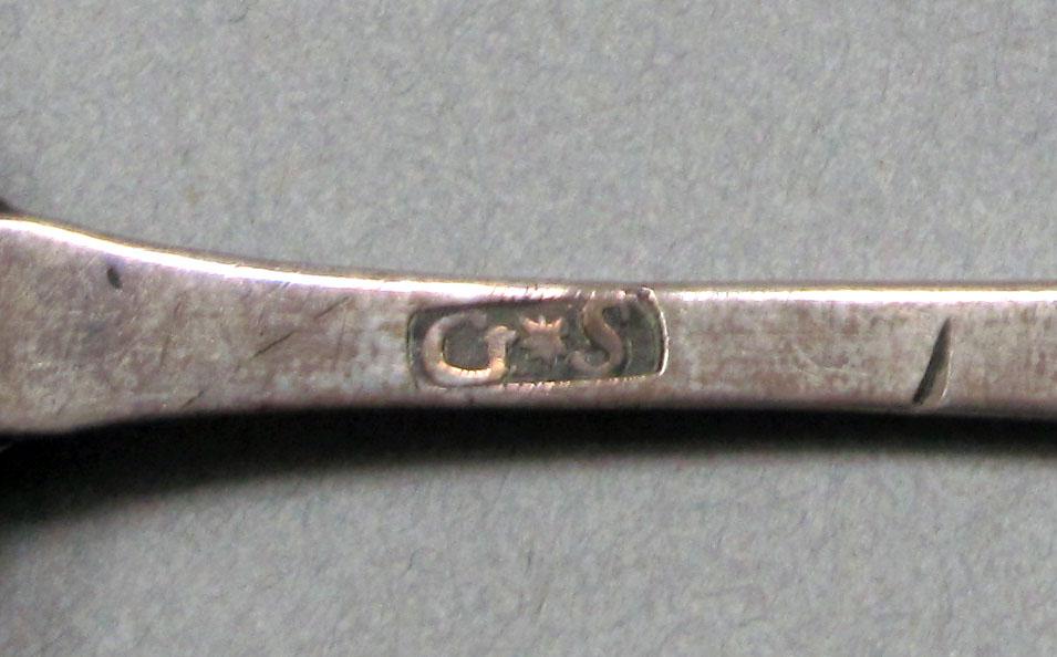 1962.0240.653 Silver spoon mark