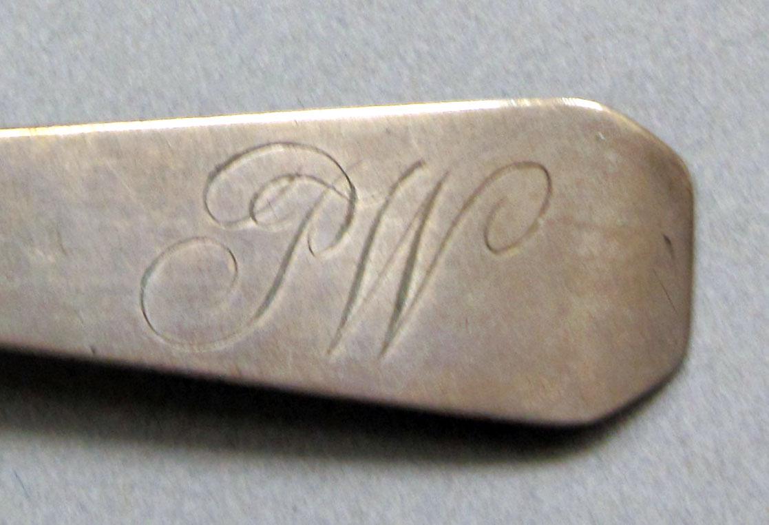 1962.0240.654 Silver spoon engraving