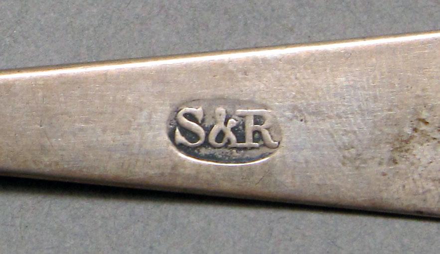 1962.0240.654 Silver spoon mark