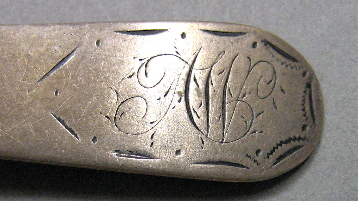 1962.0240.657 Silver Spoon engraving