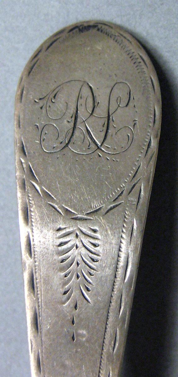 1962.0240.663 Silver Spoon engraving