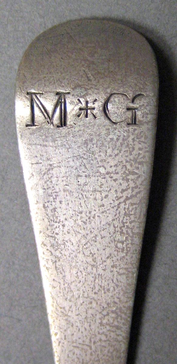 1962.0240.666 Silver Spoon engraving