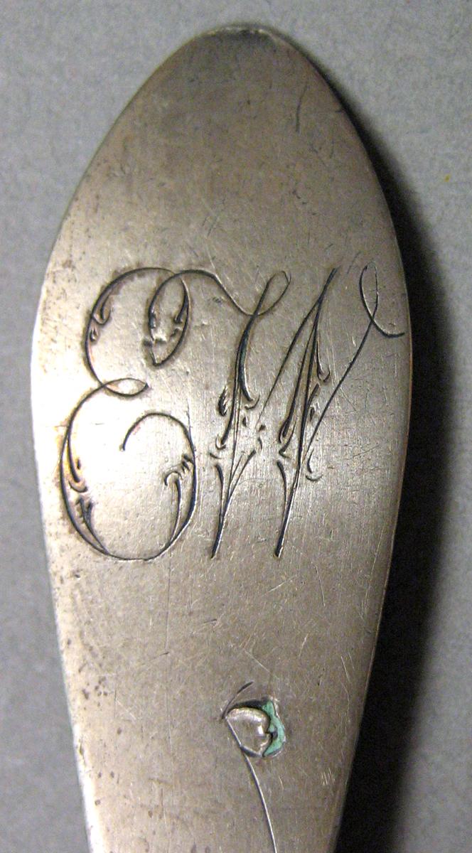 1962.0240.671 Silver Spoon engraving