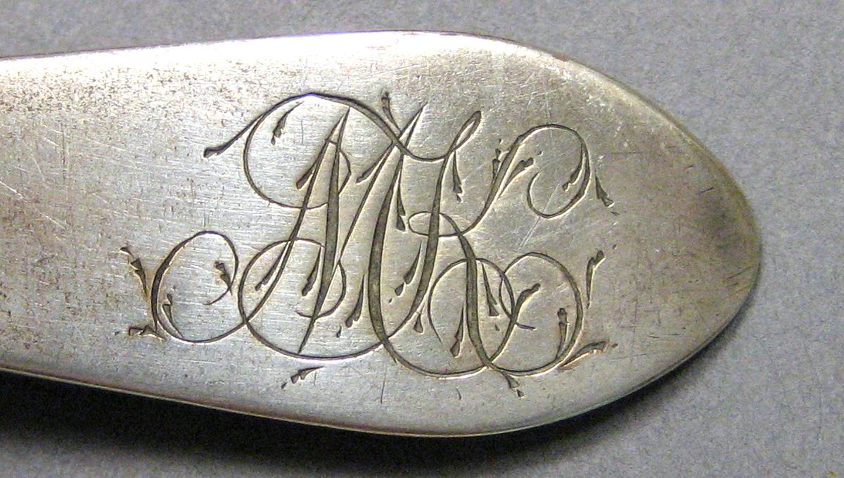 1962.0240.672 Silver Spoon engraving