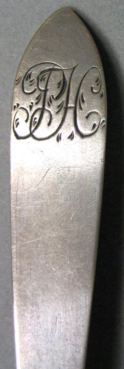 1962.0240.674 Silver Spoon engraving