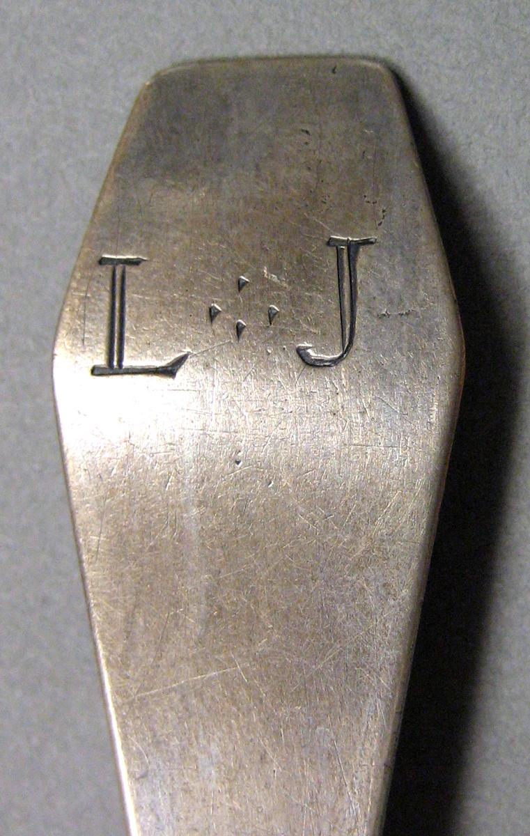 1962.0240.679 Silver Spoon engraving