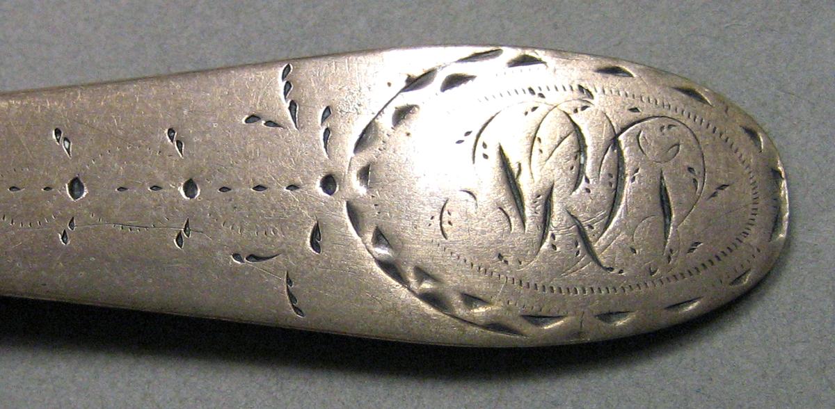 1962.0240.681 Silver Spoon engraving