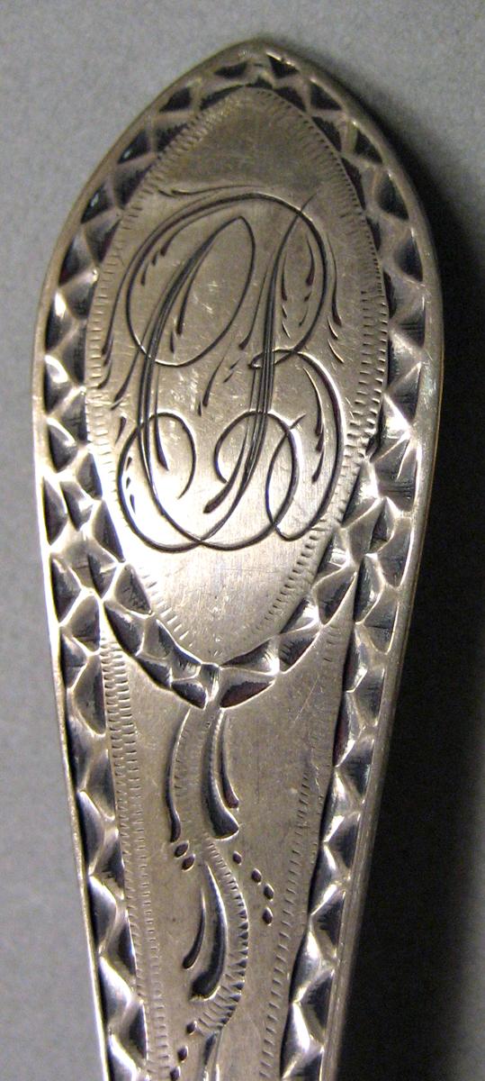 1962.0240.682 Silver Spoon engraving