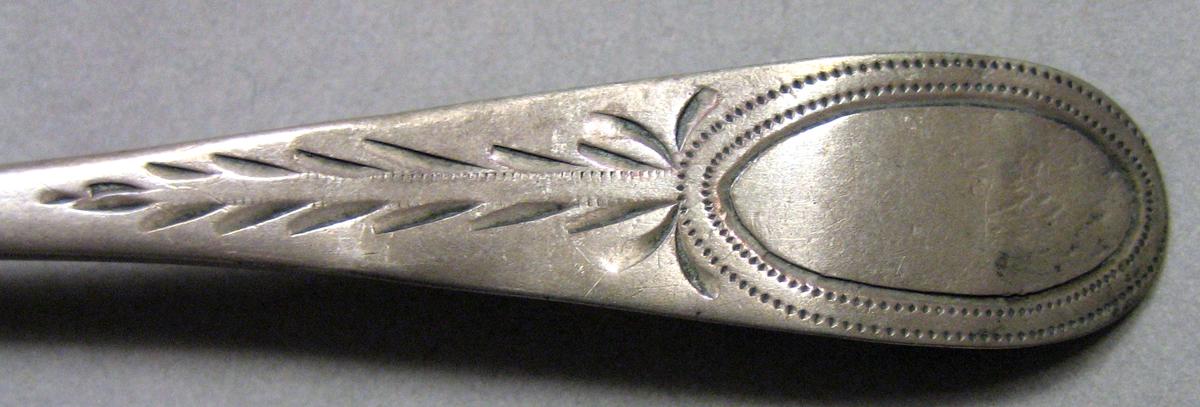 1962.0240.683 Silver Spoon engraving