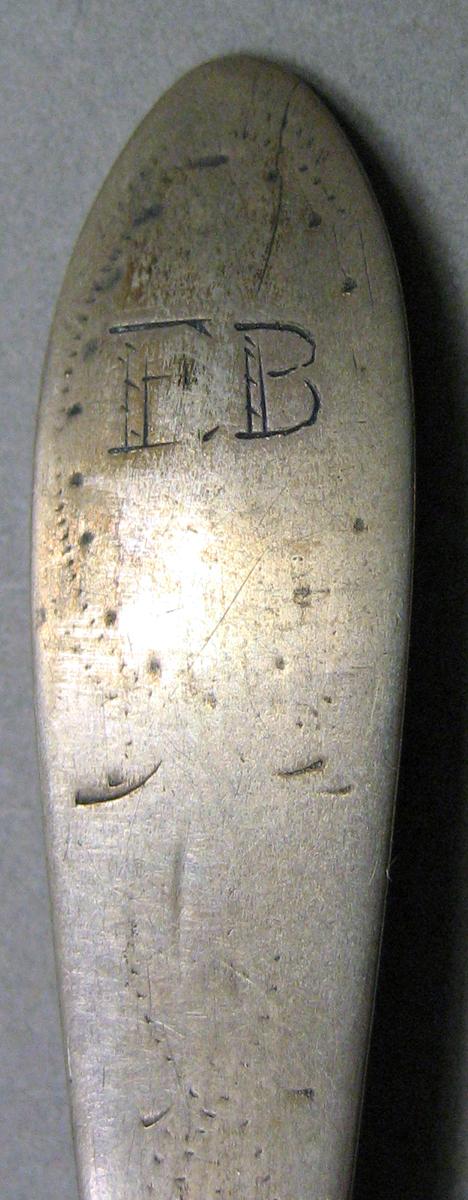 1962.0240.689 Silver Spoon engraving