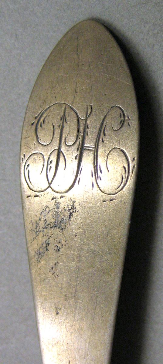 1962.0240.695 Silver Spoon engraving