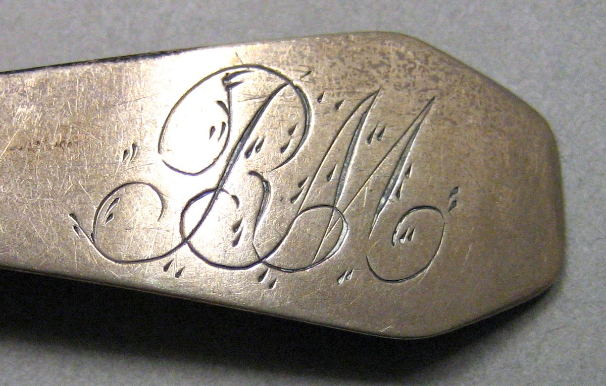 1962.0240.698 Silver Spoon engraving