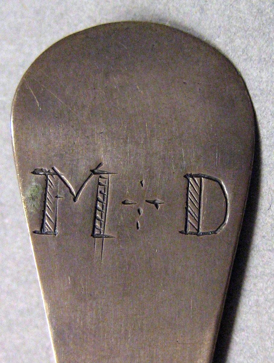 1962.0240.704 Silver Spoon engraving